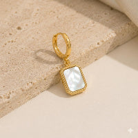 The Aurelia Emerald cut MOP Huggies